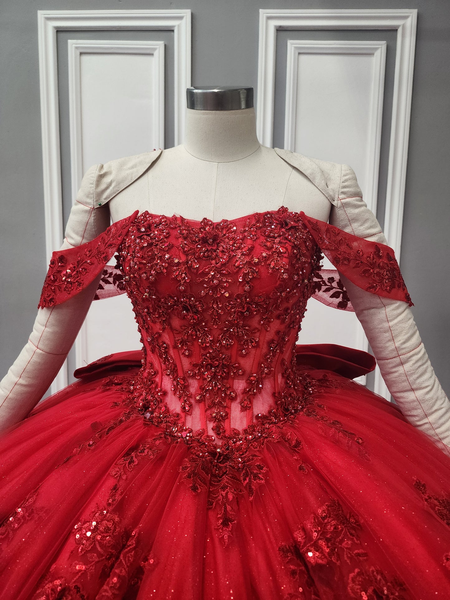 72592X – Navy Blue Off-Shoulder Quinceañera Dress with See-Through Corset, Full Ball Gown Skirt & Detachable Bow