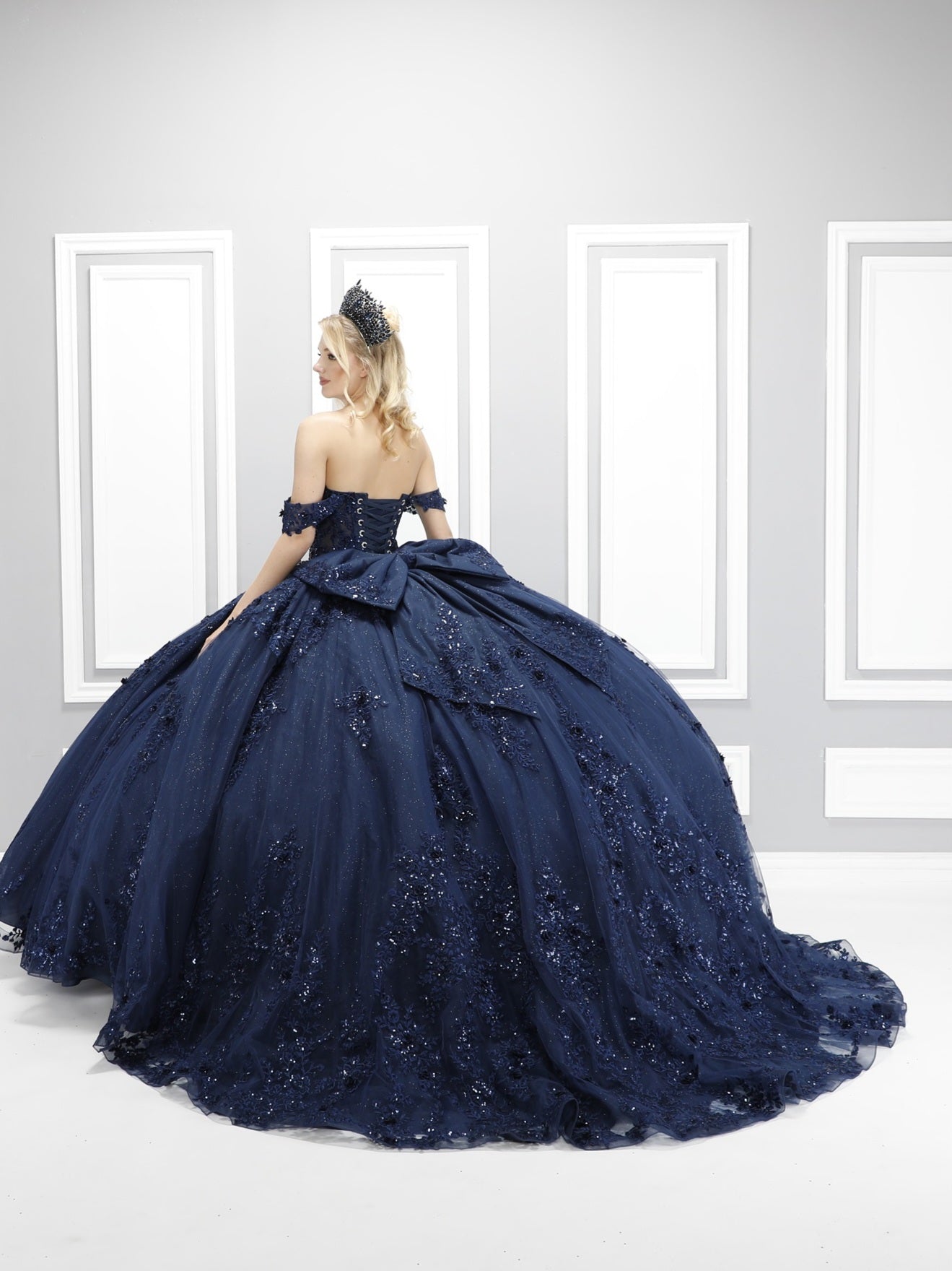 72592X – Navy Blue Off-Shoulder Quinceañera Dress with See-Through Corset, Full Ball Gown Skirt & Detachable Bow